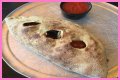 How big is a mellow mushroom calzone?